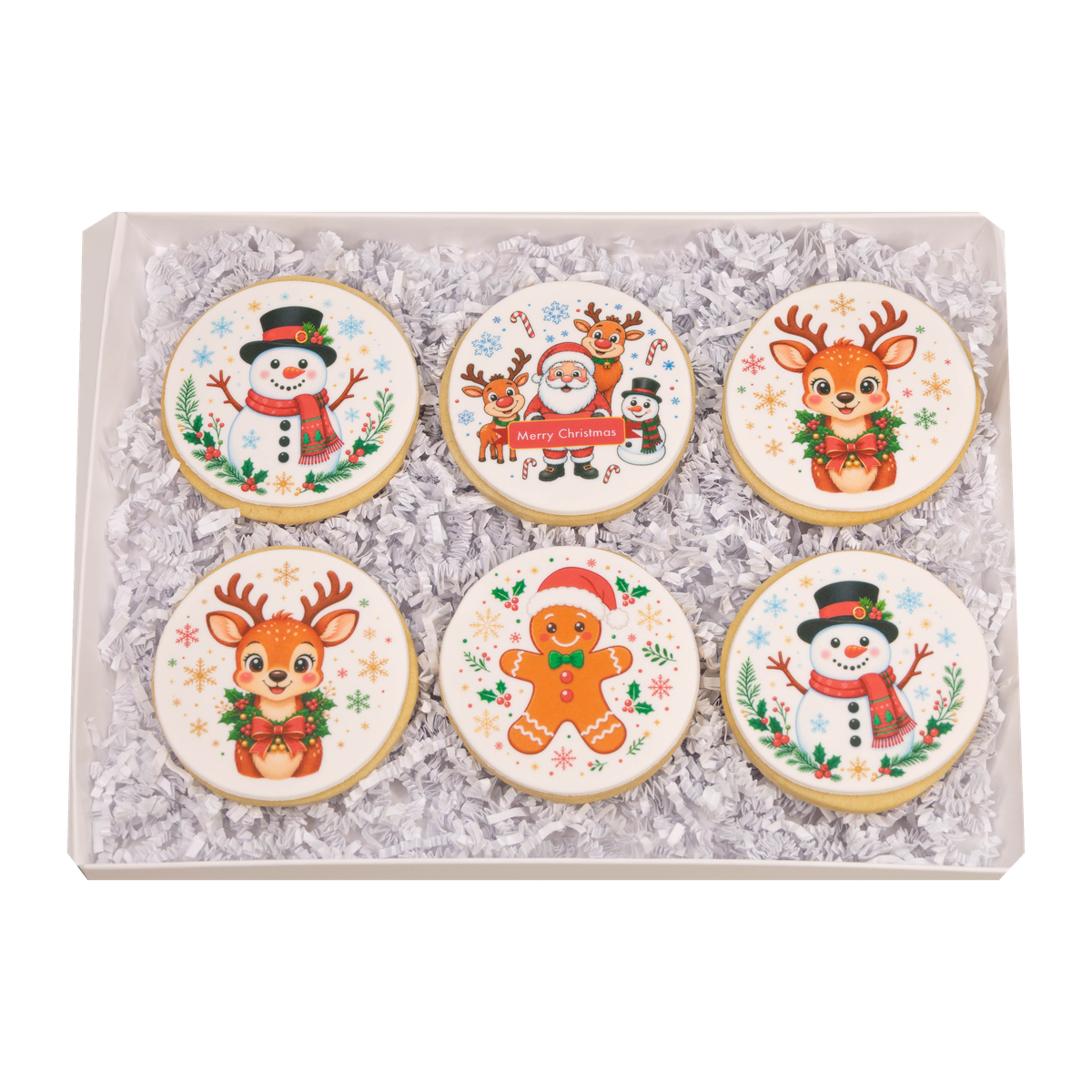 Open Christmas cookie gift box with six sugar cookies featuring snowmen, reindeer, gingerbread, sprinkles, and colorful holiday decorations