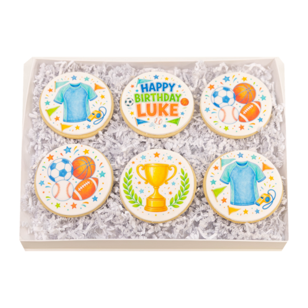 Complete open Sports Birthday Cookie Gift Box with six sugar cookies on a transparent background