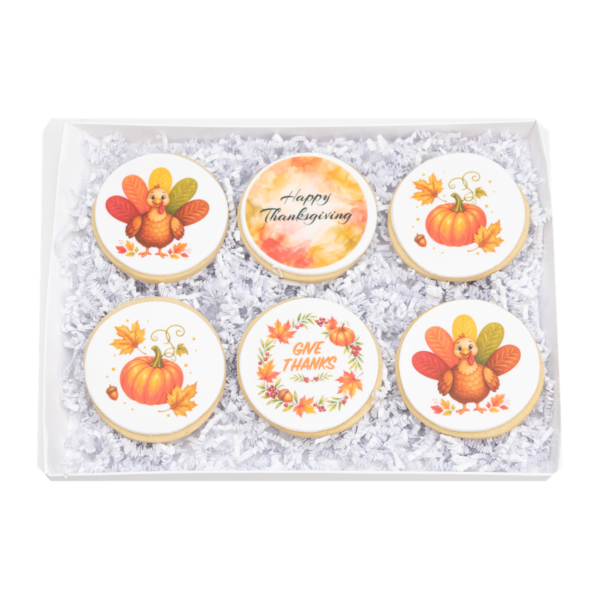 Complete open Thanksgiving Cookie Gift Box with six sugar cookies on a transparent background